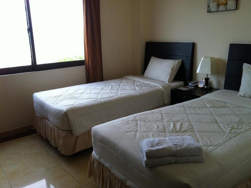 Grand Duta Hotel Palu Cameră foto