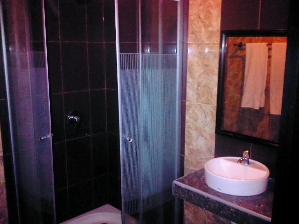 Grand Duta Hotel Palu Cameră foto